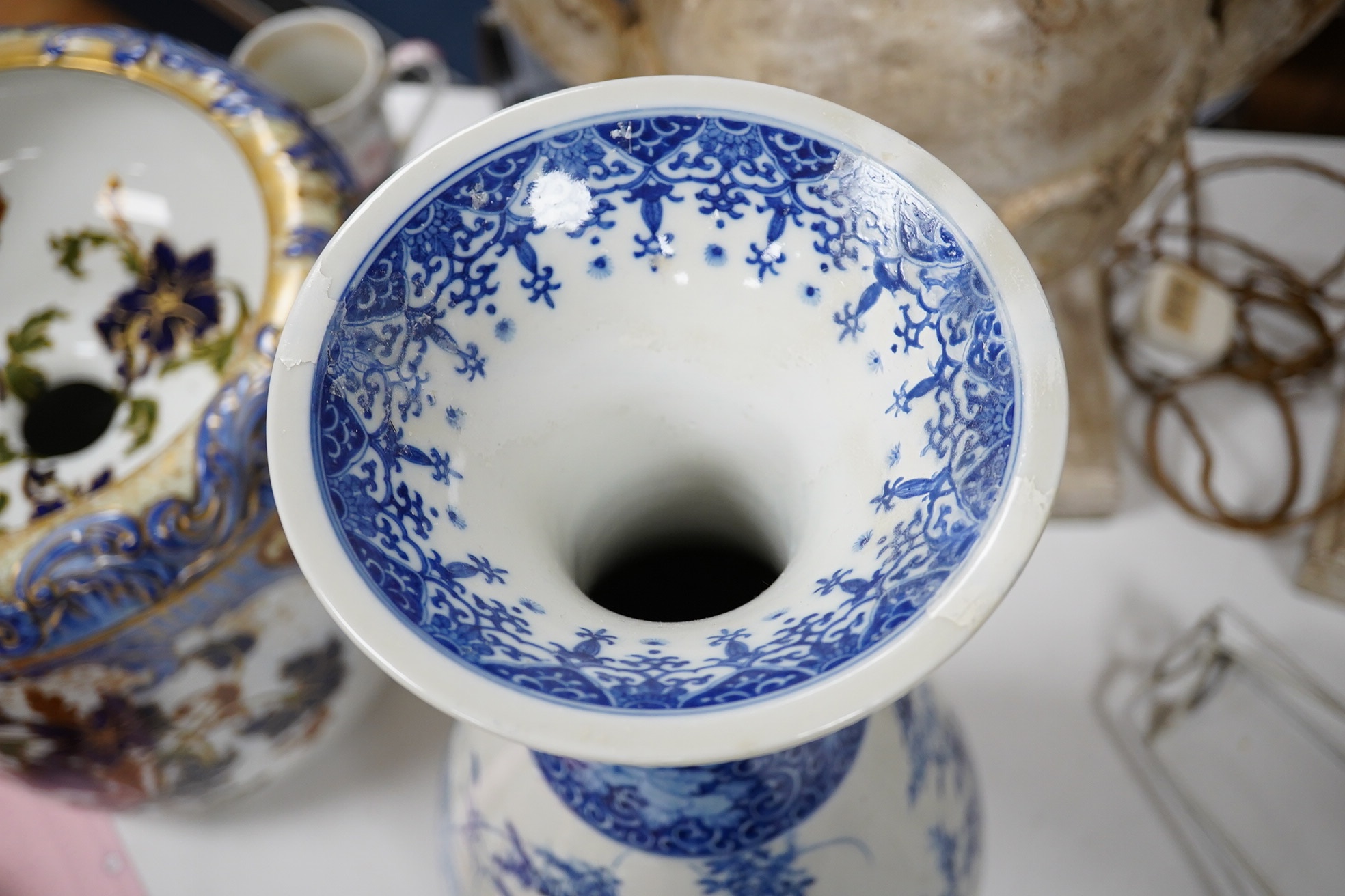 A large Japanese blue and white baluster vase, height 46cm. Condition - restoration to the rim